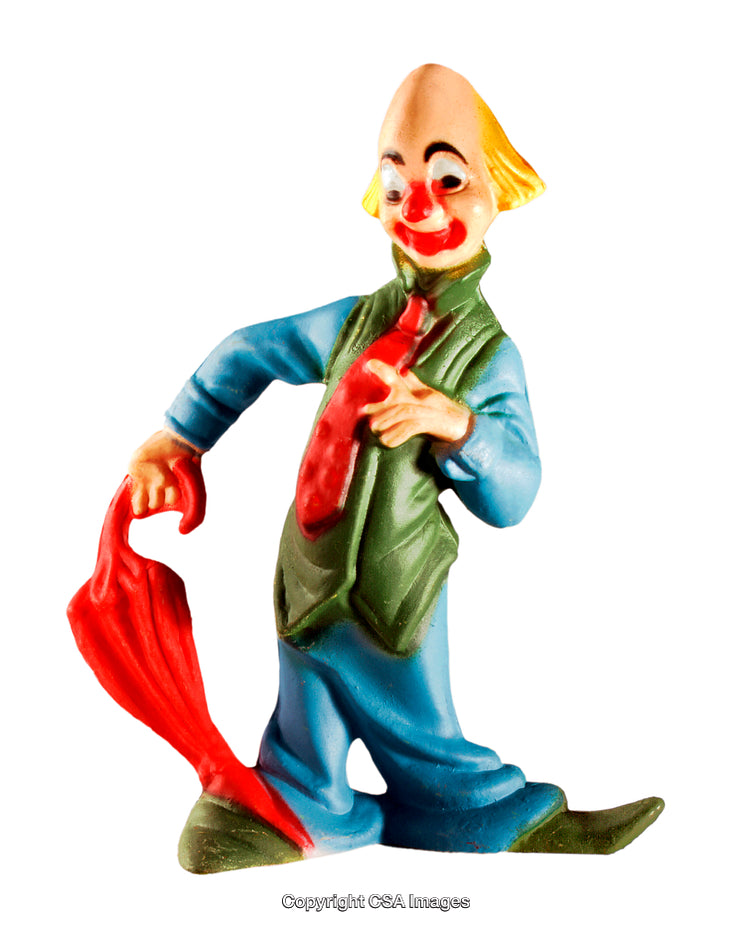 Colorful Plastic Toy Clown Figurine Holding Red Towel in Playful Pose
