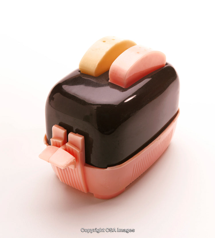 Retro-Style Plastic Toy Shaped Like A Toaster On White Background
