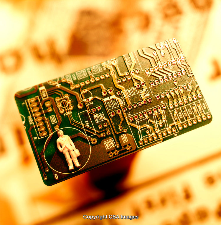 Business Concept with Figurine on Electronic Circuit Board