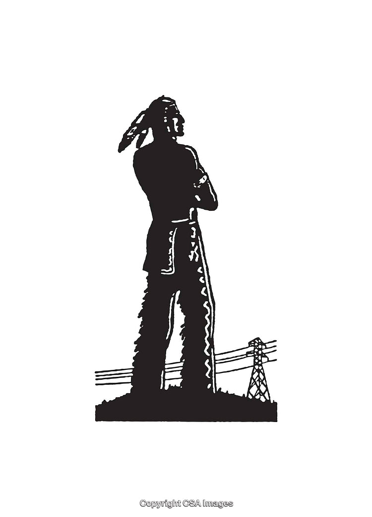 Silhouette of a Person Standing Beside Electric Transmission Towers