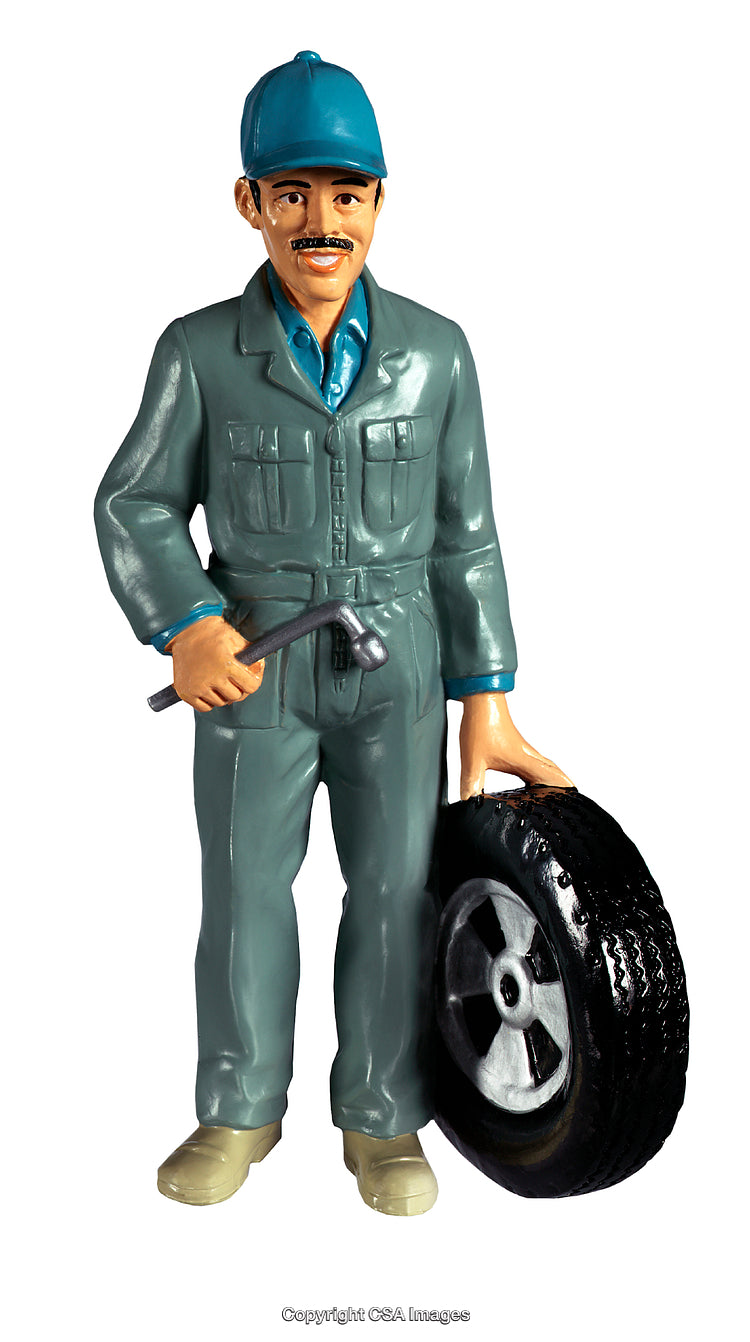 Plastic Toy Figurine of Mechanic Holding Tire and Wrench