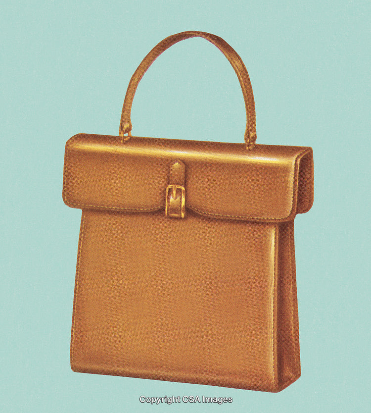 Elegant Golden Handbag Against Turquoise Background Highlighting Fashion Accessory