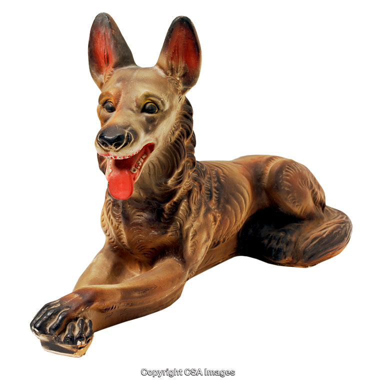Realistic Sculpture of a Lying Dog Figurine Displayed in Neutral Background