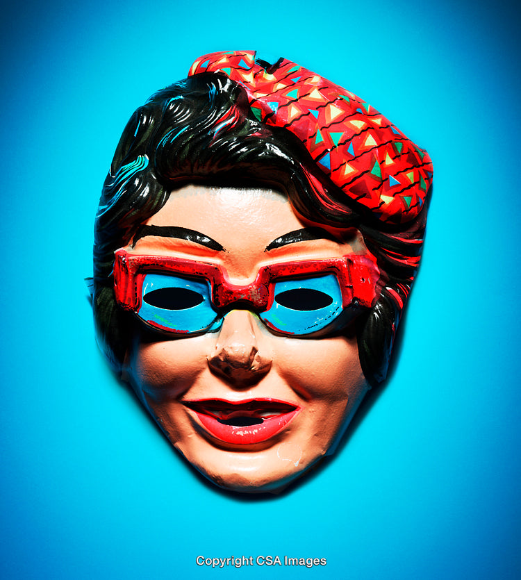 Vintage Plastic Mask with Bold Colors on Blue Background