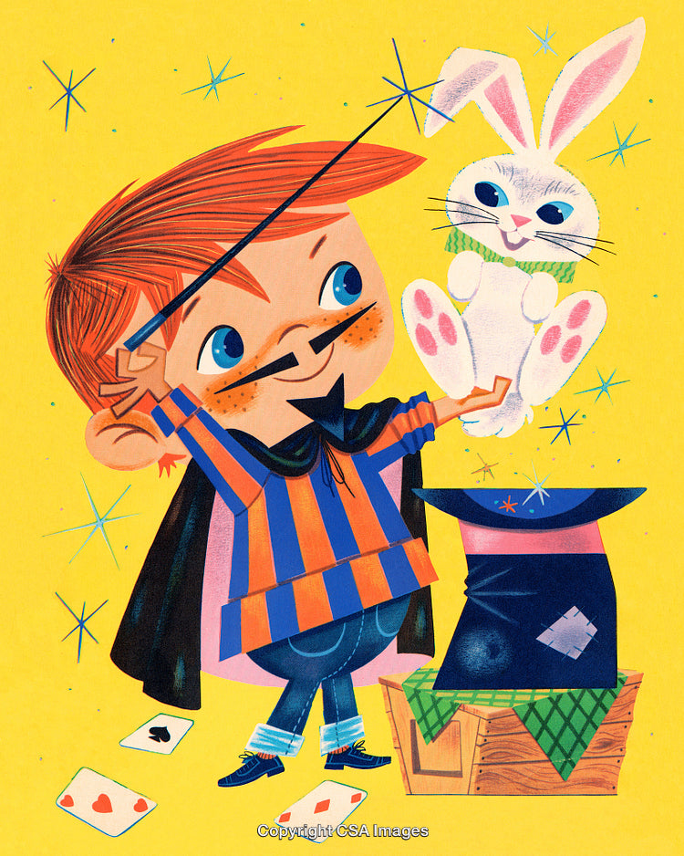 Cheerful Young Magician Performing a Magic Trick with a Rabbit and Top Hat