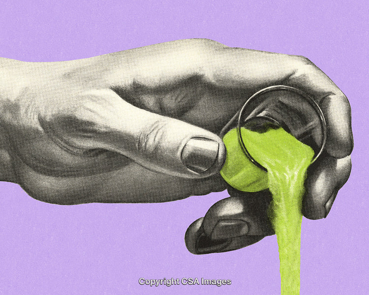 Black and White Hand Pouring Vibrant Neon Green Liquid From Small Glass