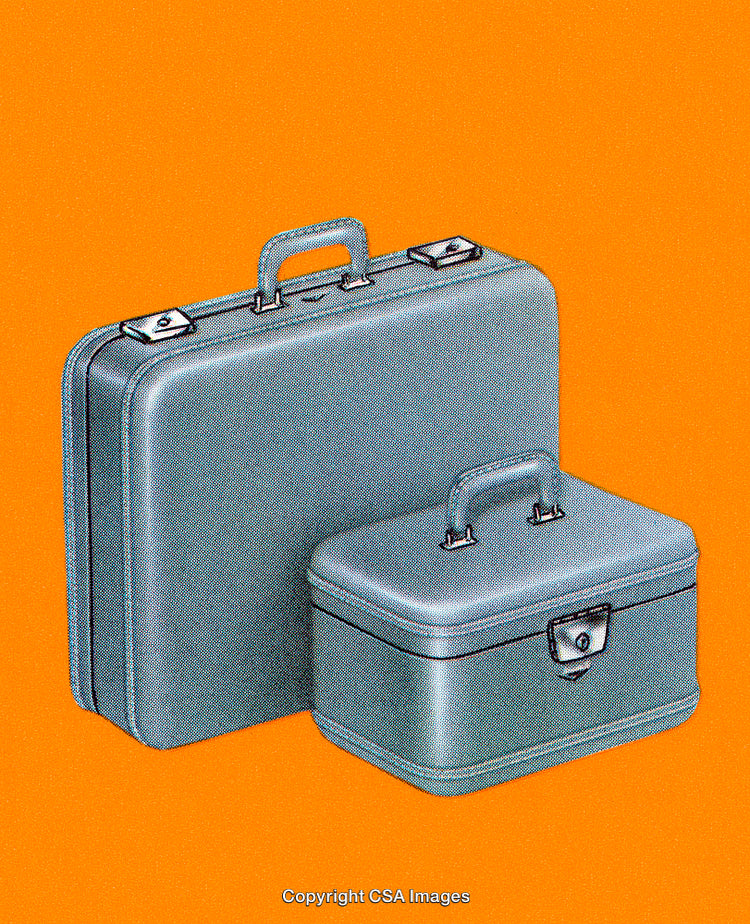 Vintage Suitcases on Vibrant Orange Background for Travel and Lifestyle Concepts