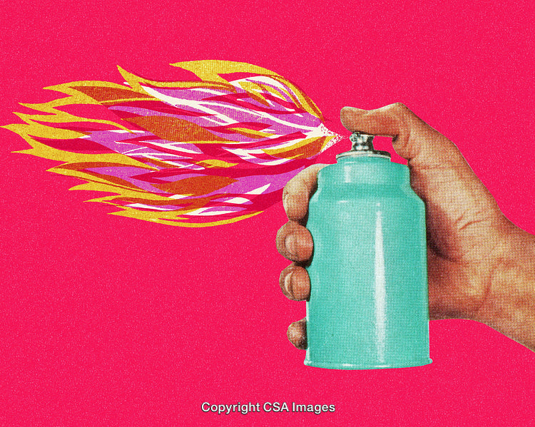 Hand Holding Spray Can with Vibrant Abstract Spray Artwork