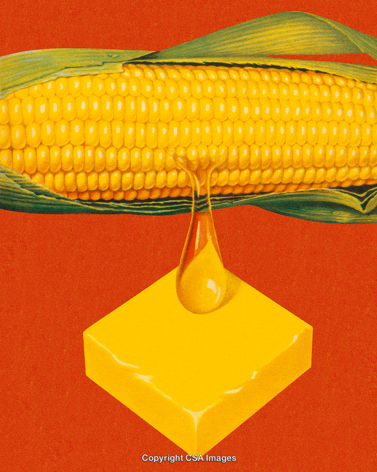 Golden Corn Cob With Melting Butter on Vibrant Red Background