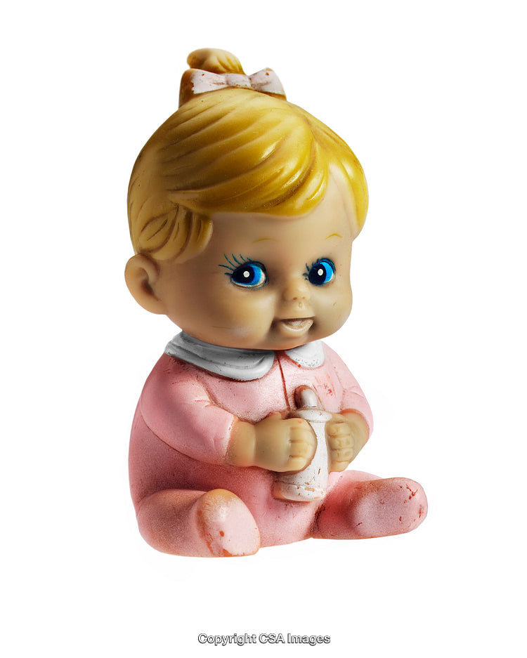 Cute Baby Doll Holding Bottle in Pink Outfit on Isolated Background