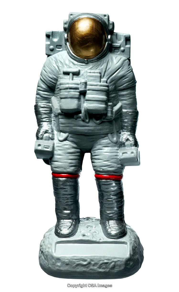 Miniature Astronaut Toy Figure on Simulated Moon Surface