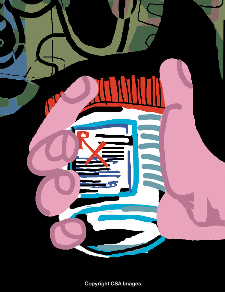 Hand Holding Prescription Bottle
