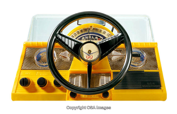 Vintage Yellow Toy Steering Wheel With Dashboard Details and Speedometer