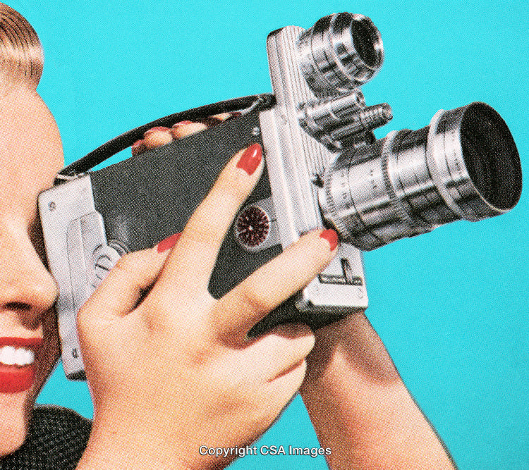 Retro Styled Close-Up of a Woman Holding a Vintage Film Camera