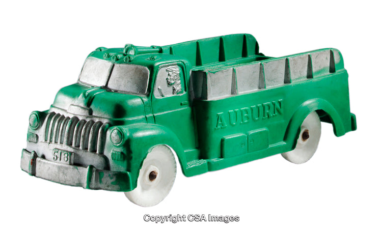Vintage Green Plastic Toy Truck Featuring Classic Design Details and Retro Appeal
