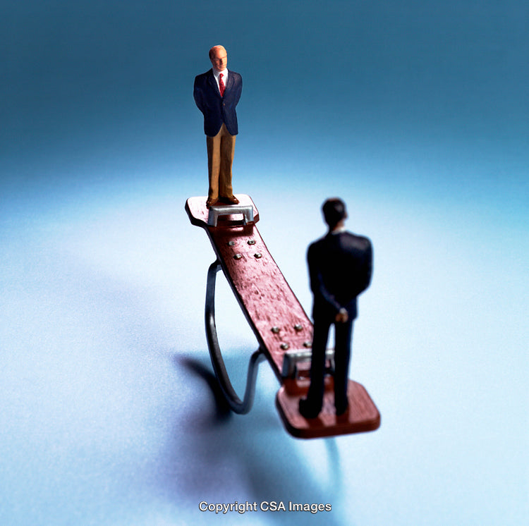 Two Miniature Figures on a Seesaw Symbolizing Balance and Power Dynamics