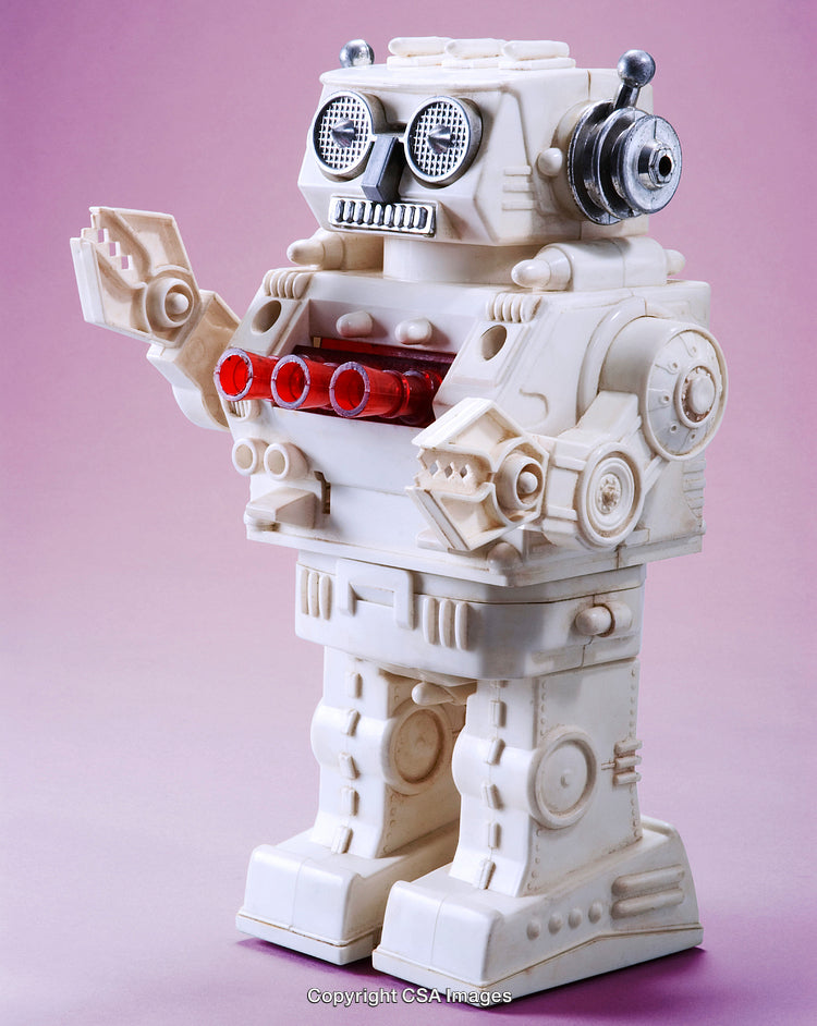 Vintage Plastic Robot Toy on Pink Background with Retro Design Appeal