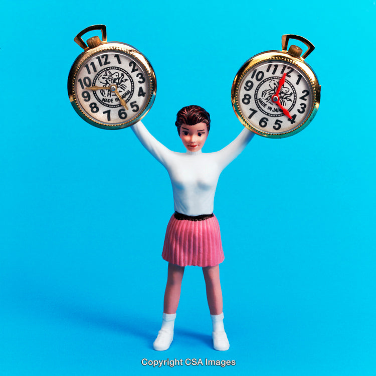 Toy Figure with Pocket Watches Against a Blue Background