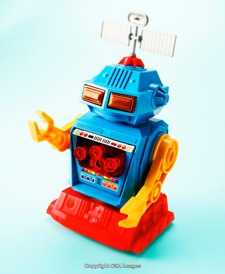 Colorful Vintage Plastic Robot Toy with Retro Design on Blue Background