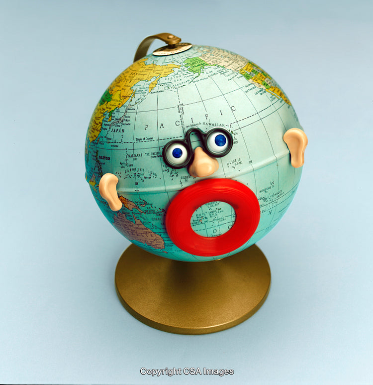 Creative Globe With Playful Cartoon Features on a Light Background