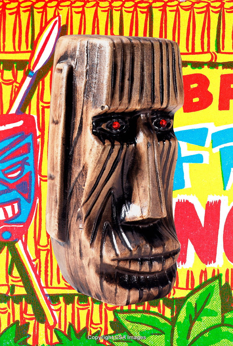 Wooden Mask with Red Eyes in Vibrant Tropical Background Setting