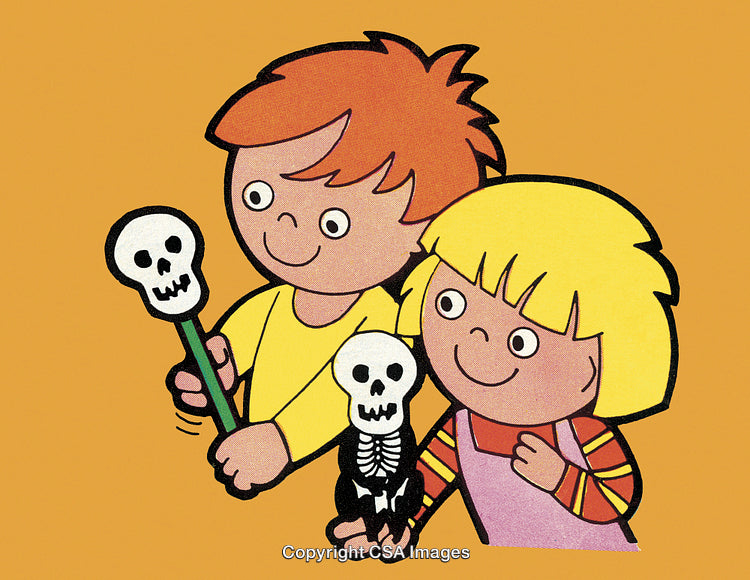 Children Enjoying Halloween Decorations with Skeleton Toys Against Orange Background