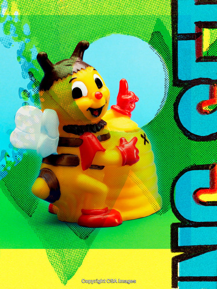 Colorful Plastic Toy Bee on Bright and Textured Background
