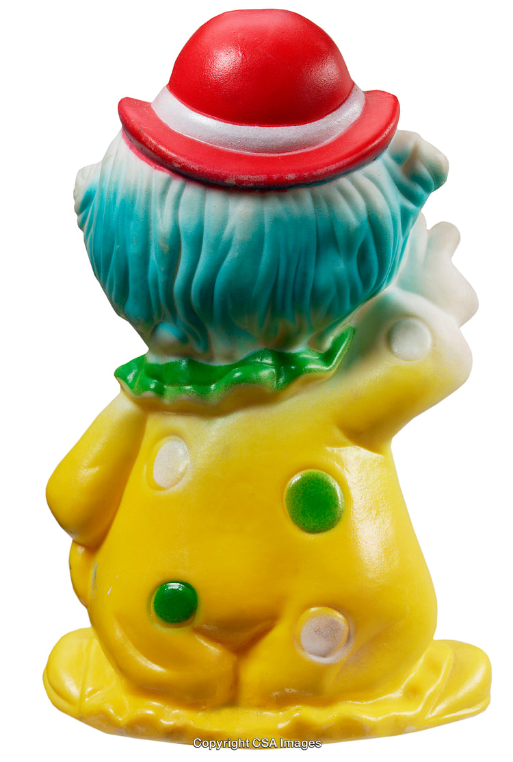 Colorful Plastic Figurine of a Clown in a Bright Costume
