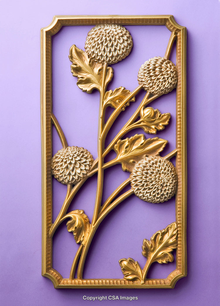 Gold Ornamental Flowers and Leaves On a Purple Background