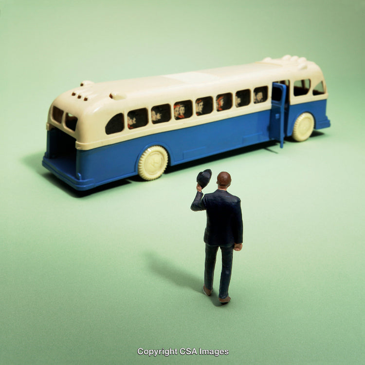 Miniature Figure Waving at a Vintage Toy Bus in Pastel Setting