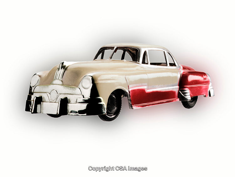 Vintage Style Red and White Toy Car Isolated on White Background