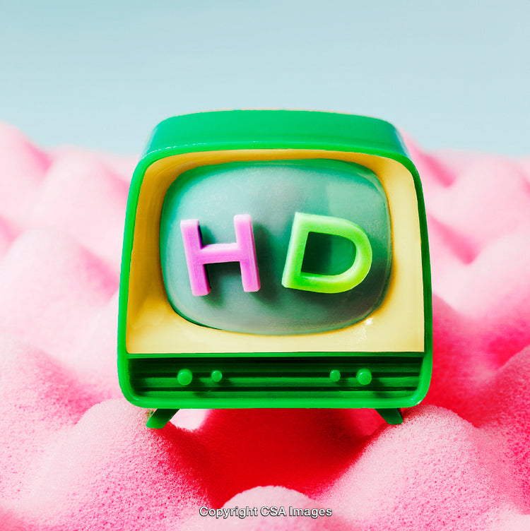 Colorful Retro TV Toy Displaying HD on Soft Pink Background