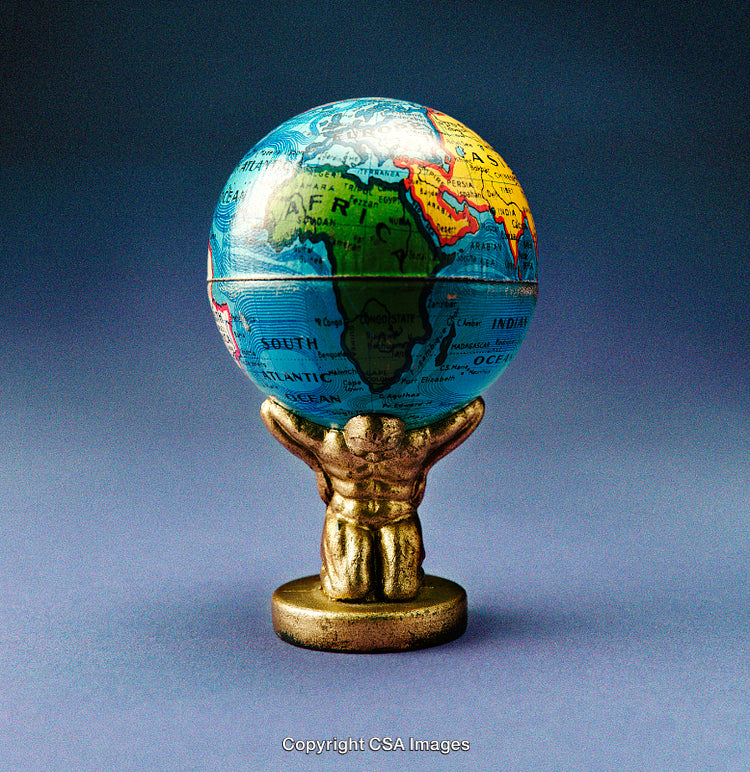 Figurine Holding a Globe Displaying Africa Against a Blue Background