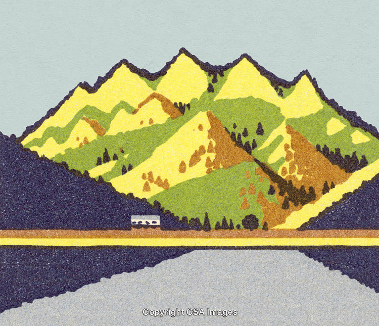 Scenic Mountain Range With Yellow and Green Peaks By a Calm Lake