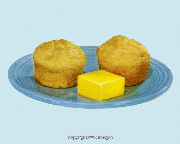 Golden Brown Muffins with Butter Cube on Blue Plate