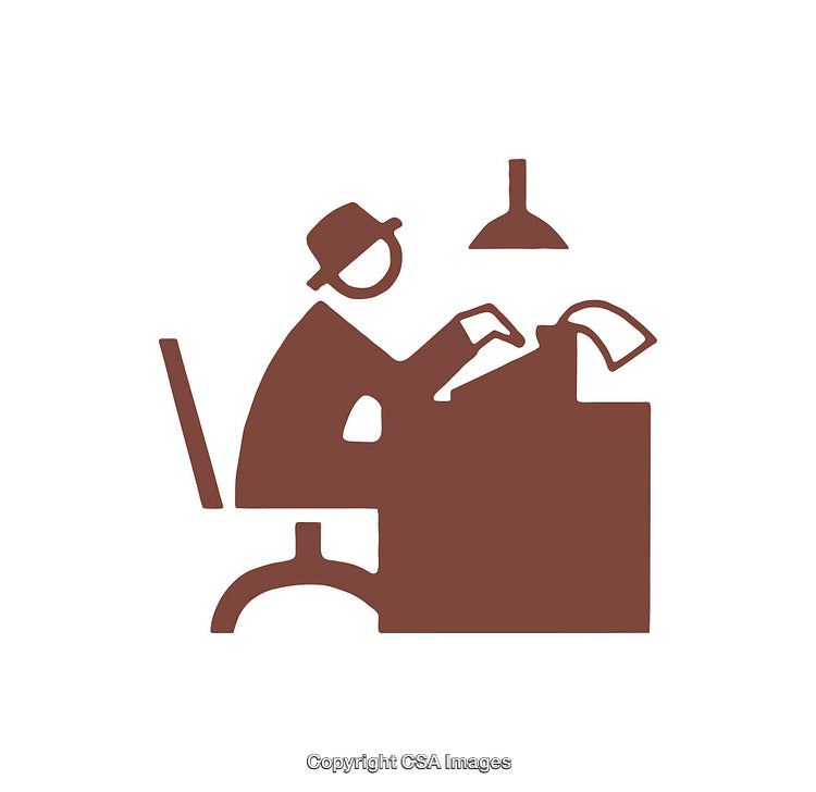 Silhouette of an Office Worker Typing Under Desk Lamp