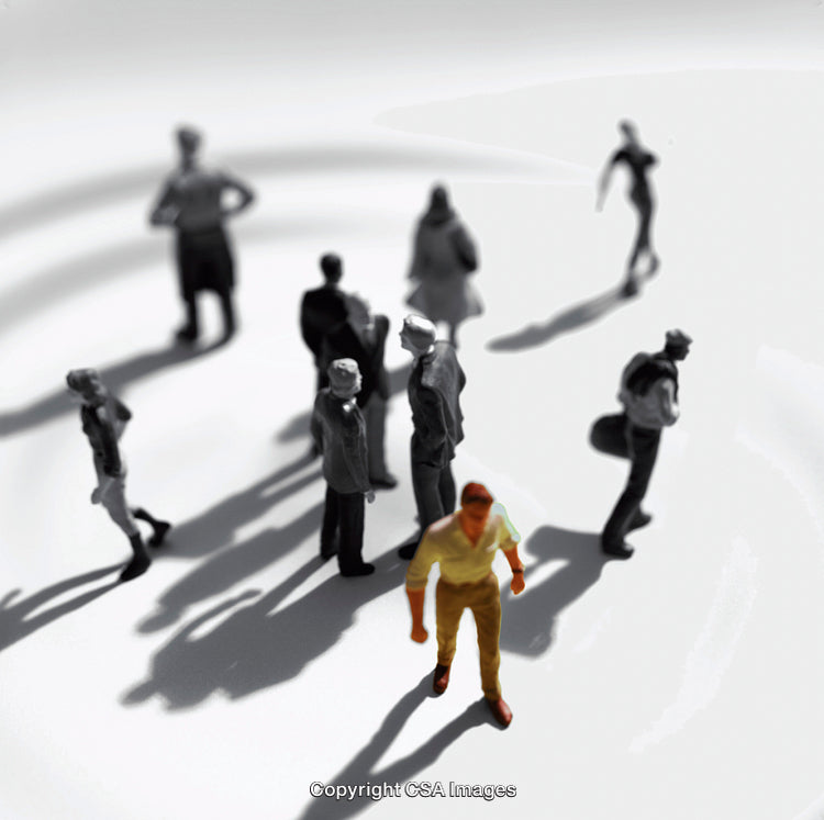 Conceptual Art of Isolated Figure Among Grouped Plastic Miniatures