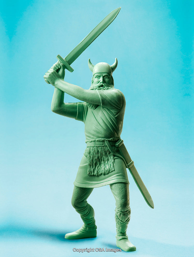 Green Plastic Viking Action Figure Holding Sword Against Blue Backdrop
