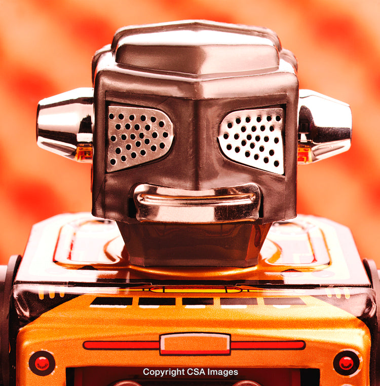 Vintage Retro Robot Toy Figurine in Close-Up with Orange Background