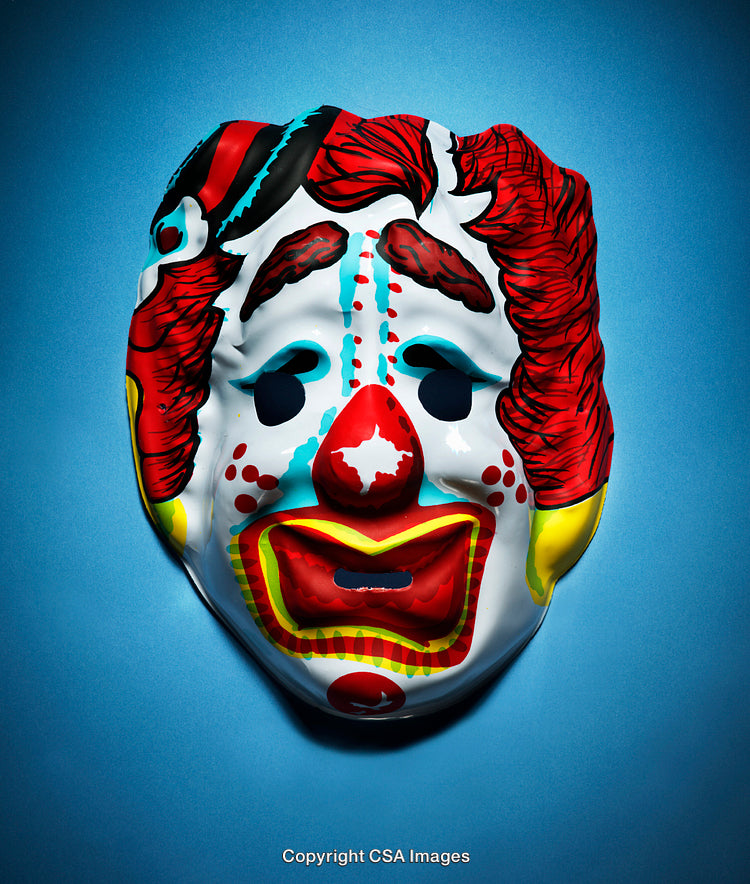 Colorful Clown Mask on a Bright Blue Background