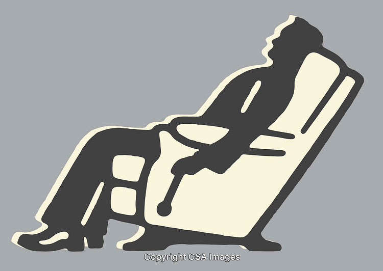 Silhouette of a Relaxed Person Reclining in a Comfortable Chair