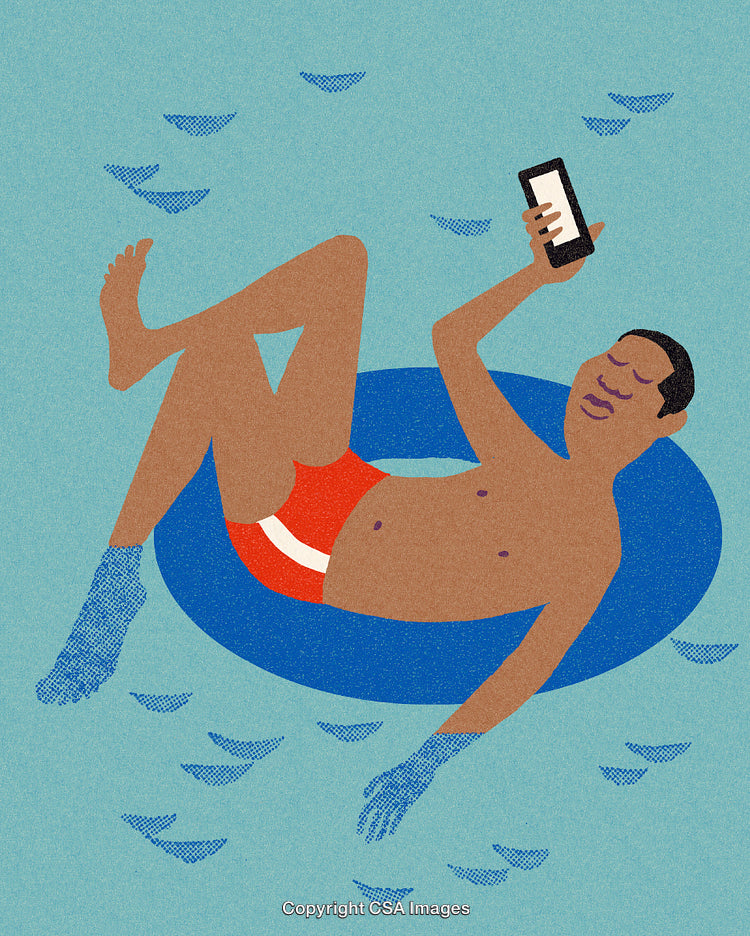 Man Relaxing on Inflatable Tube While Using Smartphone Outdoors