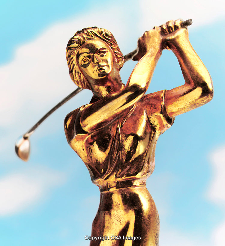 Golden Trophy Statue Depicting a Golfer Swing Against Blue Sky