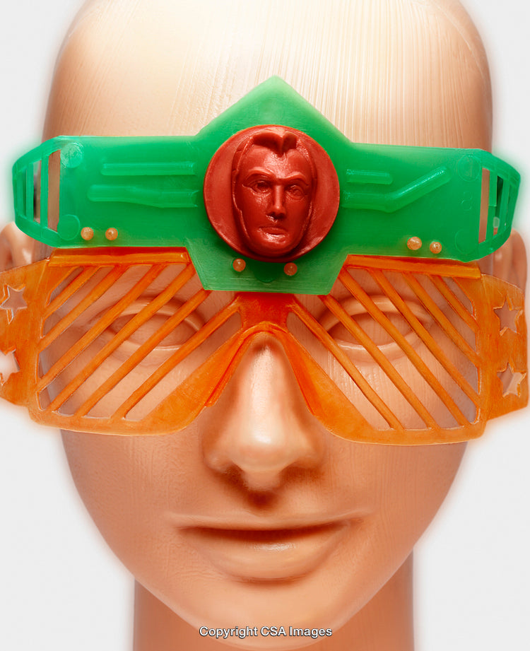 Colorful Toy Head with Futuristic Plastic Accessories Displayed