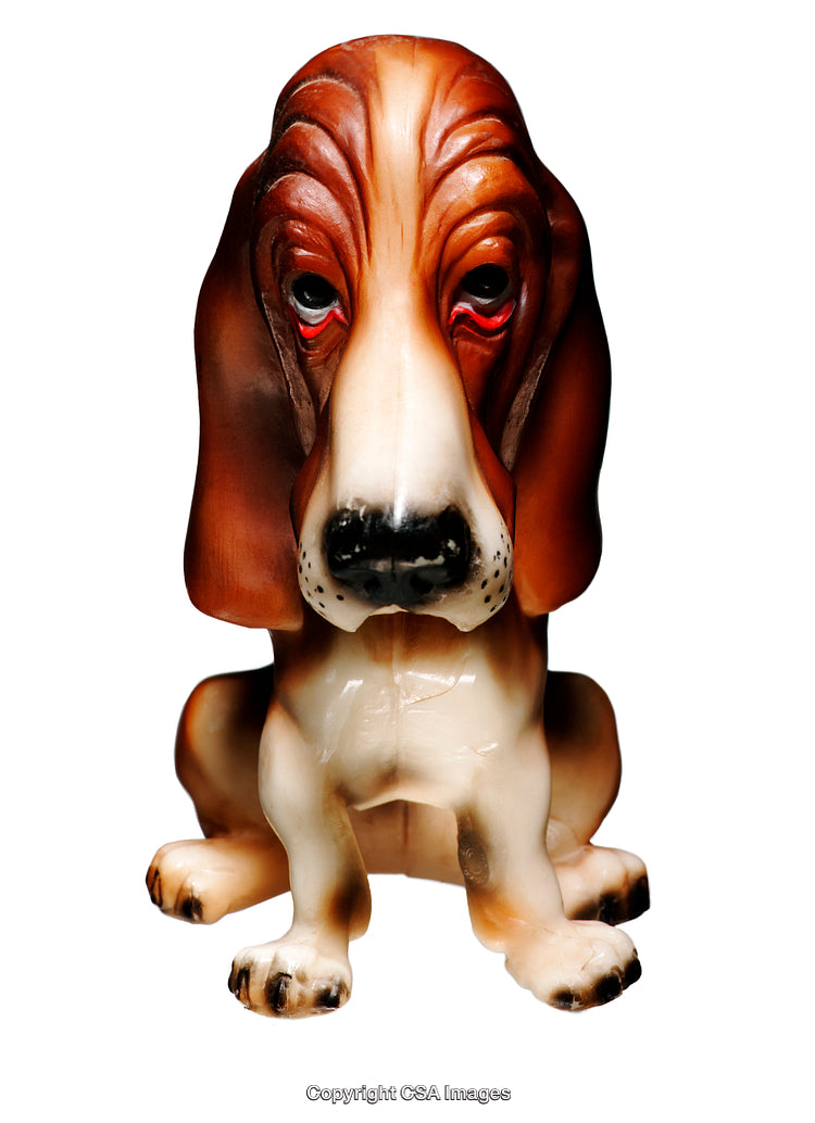 Close-Up of a Detailed Basset Hound Figurine on White Background