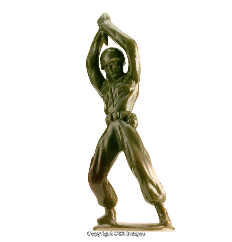 Green Plastic Toy Soldier Holding a Weapon in Aggressive Pose