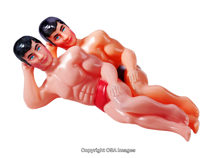 Two Plastic Toy Figures Posed Together in a Symmetrical Arrangement
