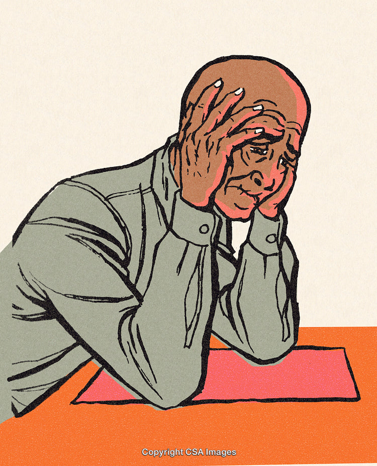 Elderly Person Sitting at Table in Contemplative Thought
