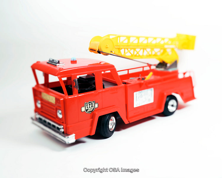 Classic Red Toy Fire Truck with Extendable Ladder on White Background