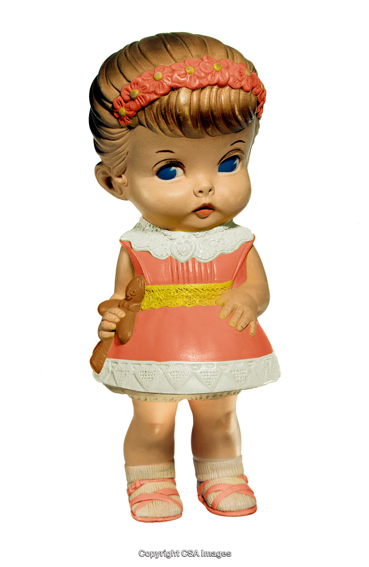 Vintage Plastic Doll Figurine Holding a Small Accessory in Bright Colors